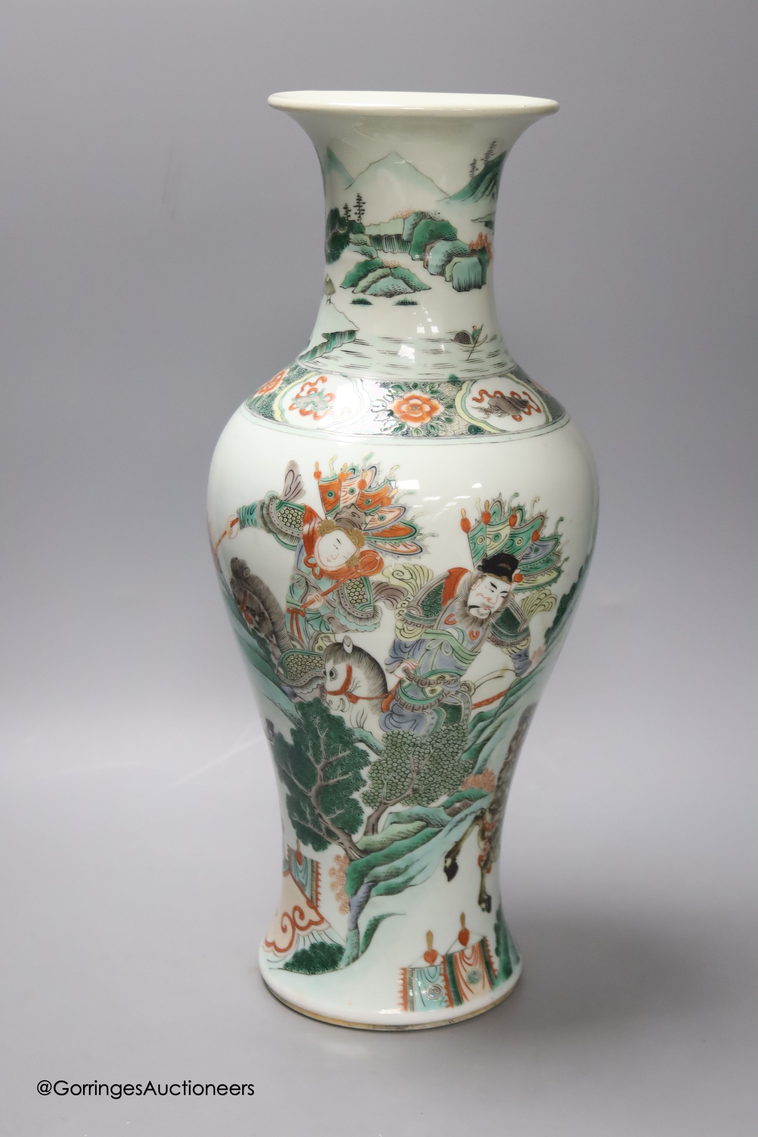 A large 19th century Chinese famille verte 'warriors' vase, height 45cm, restored neck